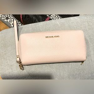 Michael Kors pink pebbled leather wallet